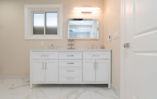 renovation bathroom double sink tile floor